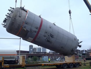 A tank being carefully lifted off the production line, ready to be transported to the workshop for internal lining installation