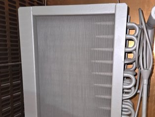 Treated coil with Si 17N E coating for harsh acidic operating conditions