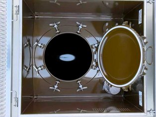 A spill box with a manhole lined with phenolic-based, heat-cured coatings Si 14 E and Si 14 E BKW top coat for high resistance to chlorinated hydrocarbons
