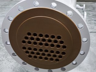 Shell and Tube Bundle with seal welded tube ends lined tubeside with electrically conductive Si 17 E Shell and Tube Bundle with seal welded tube ends lined tubeside with electrically conductive Si 17 E